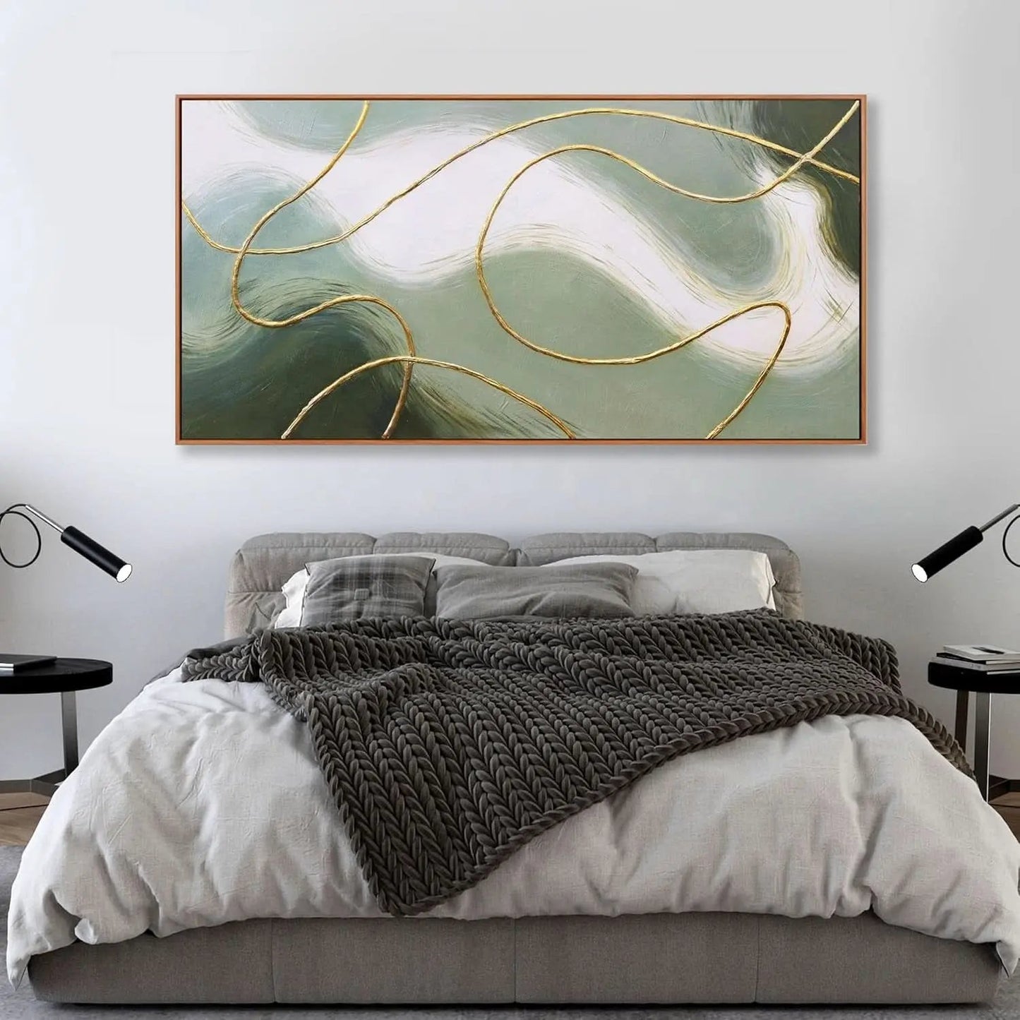 Modern bedroom with abstract art above a bed