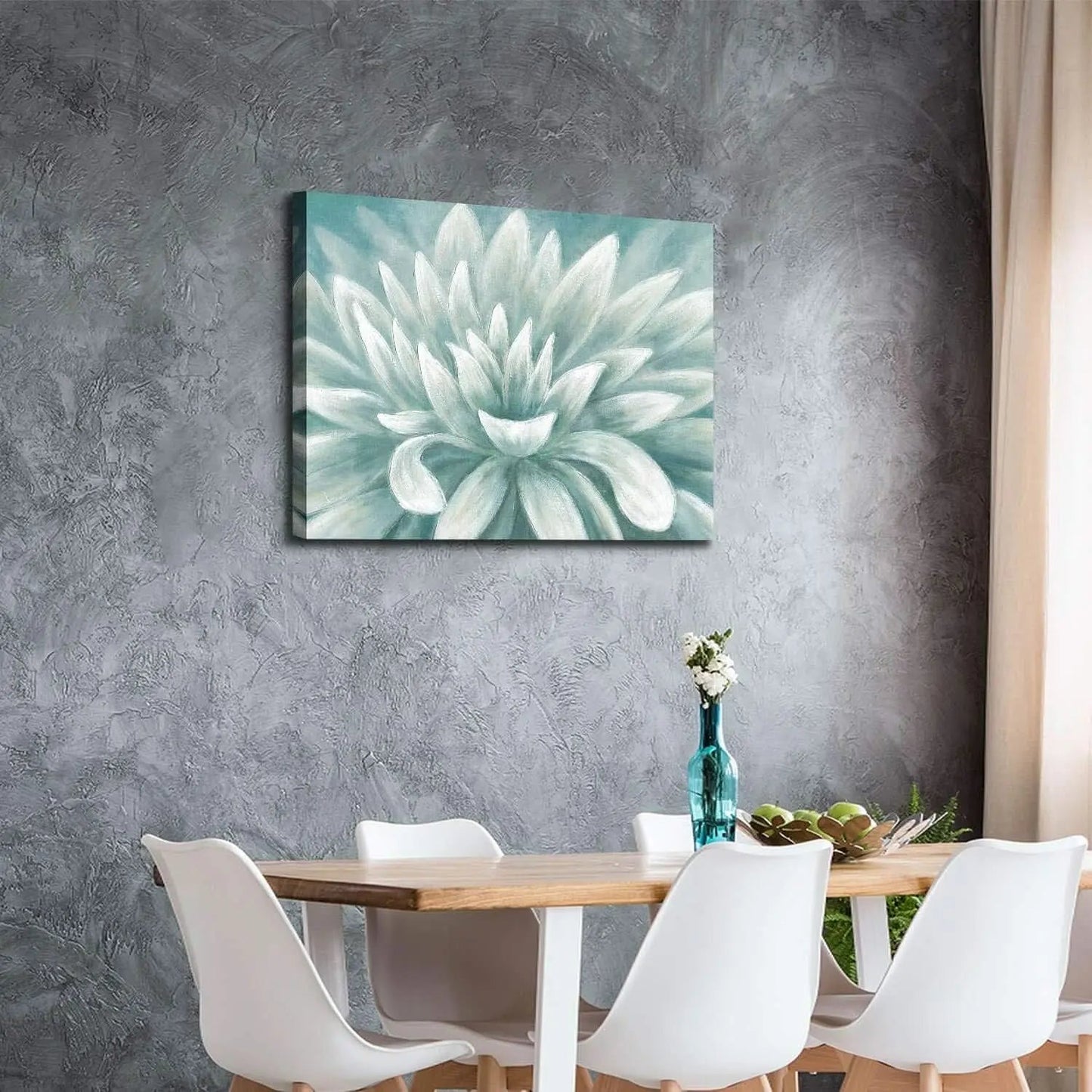 Dining room with a floral painting on the wall, table, and chairs.