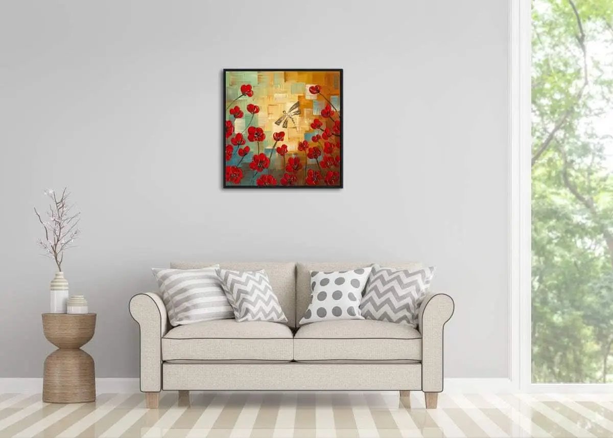 Living room with a beige sofa, decorative pillows, and a colorful abstract painting on the wall.