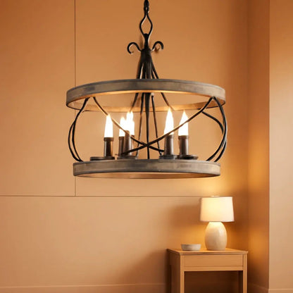 Chandelier hanging in a room with a warm ambiance
