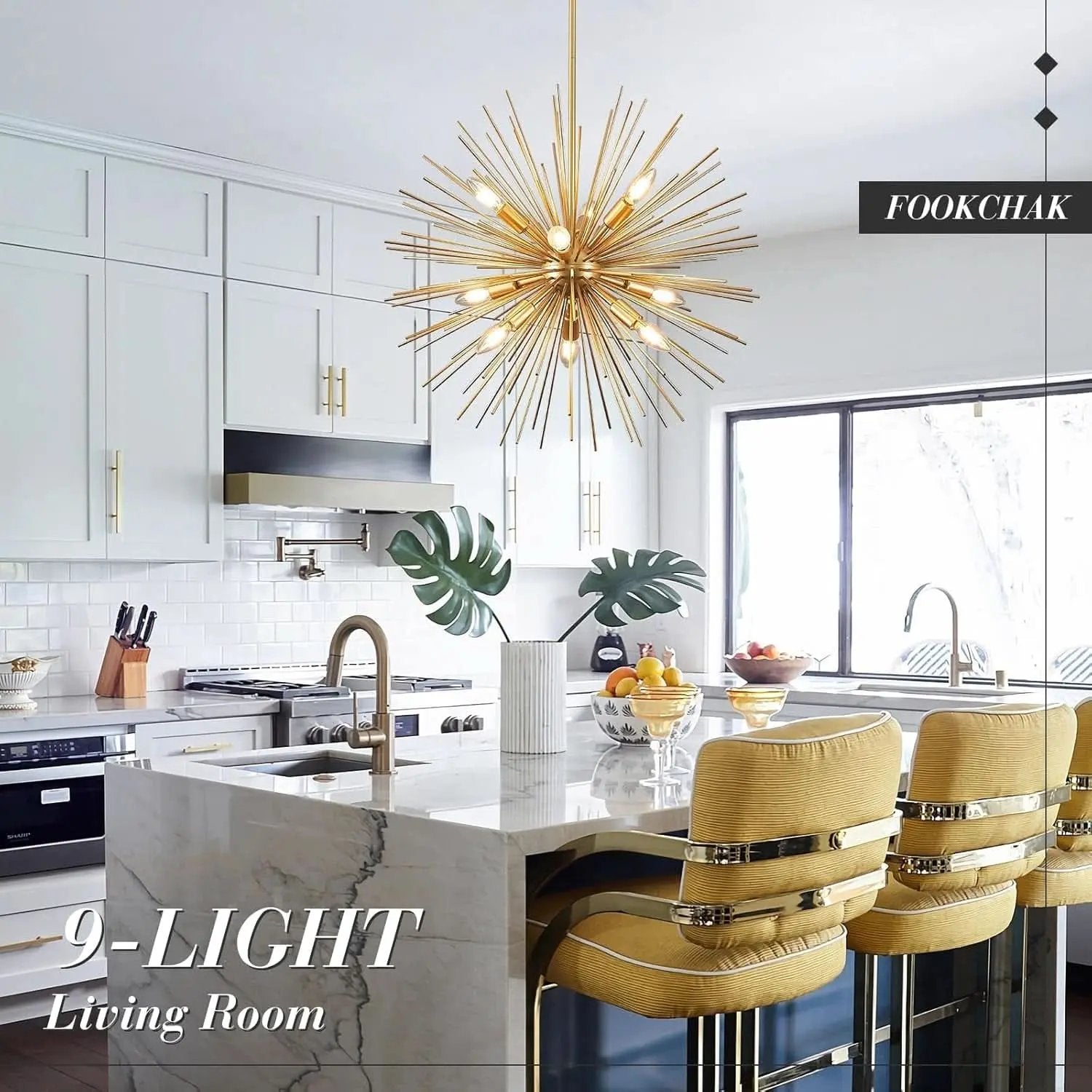 Modern kitchen with a gold chandelier, marble island, and yellow chairs.