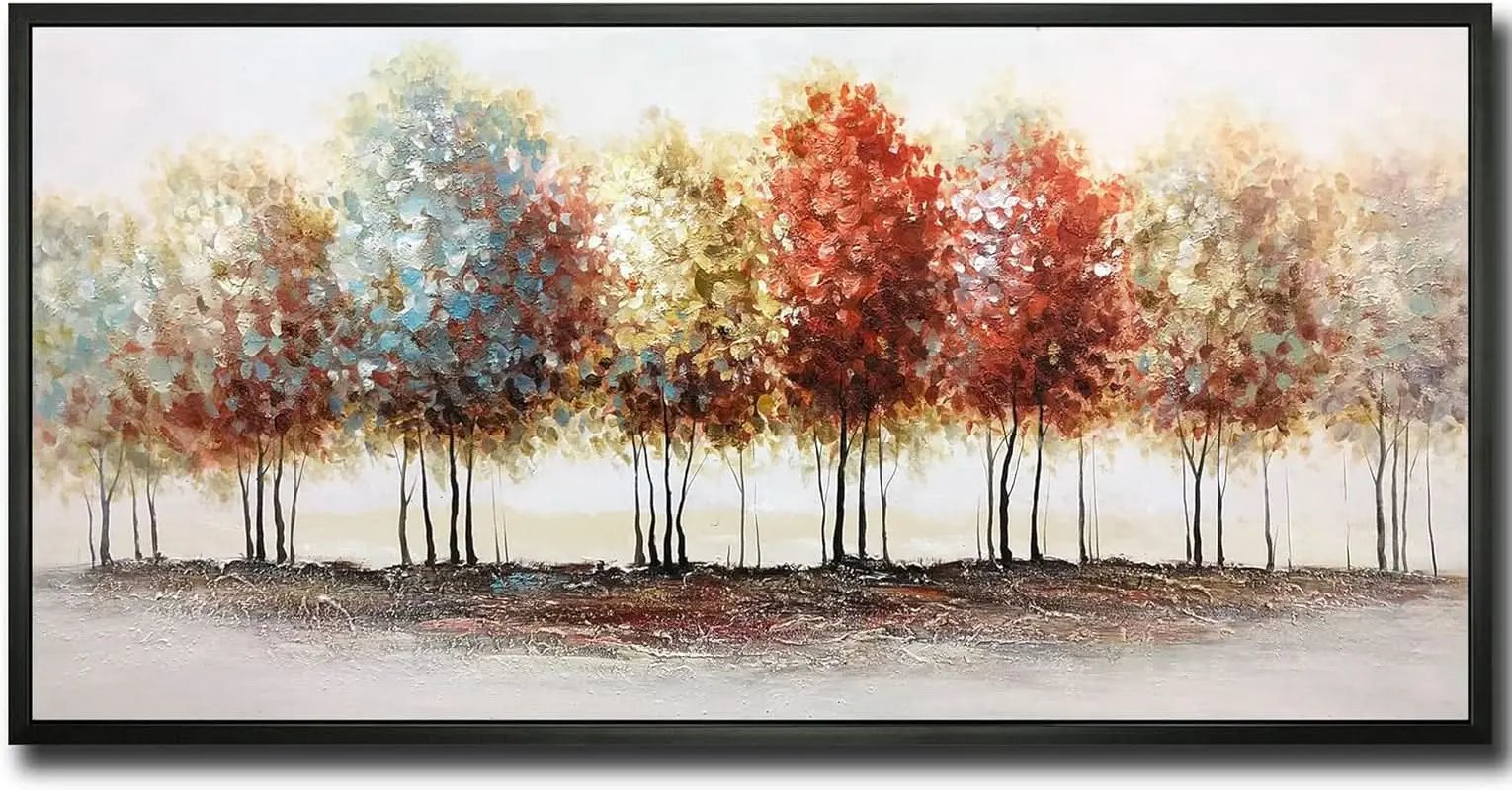Framed artwork of trees in autumn colors on a plain background