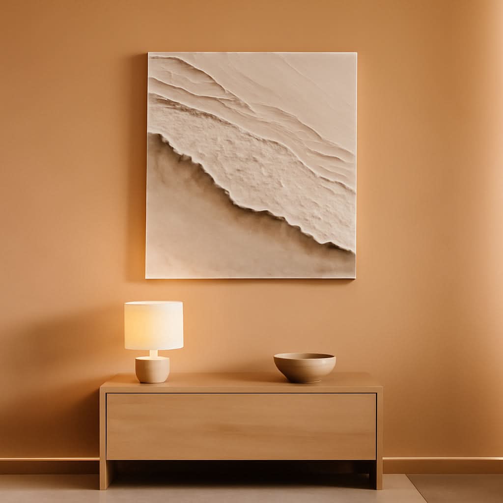 Beige wall with abstract painting, wooden cabinet, and lamp