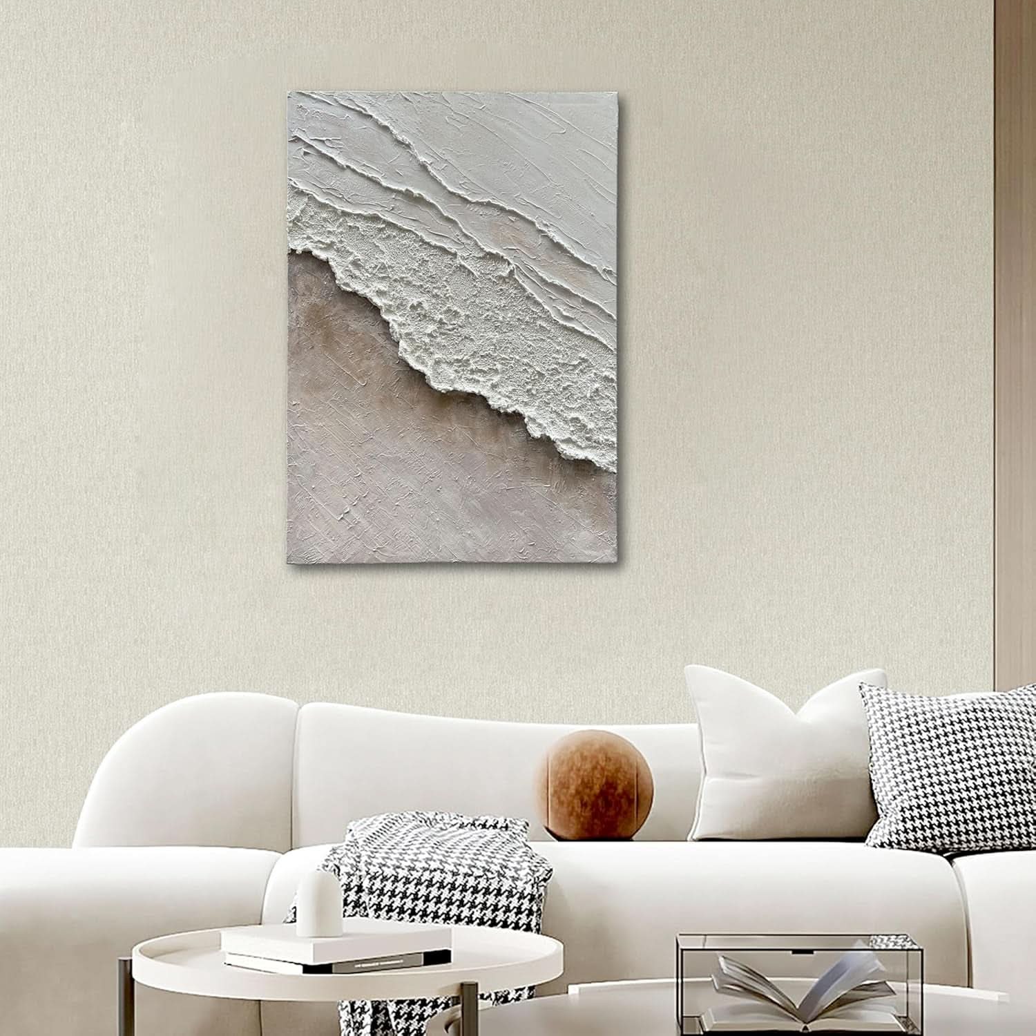 Abstract wall art above a white sofa in a living room