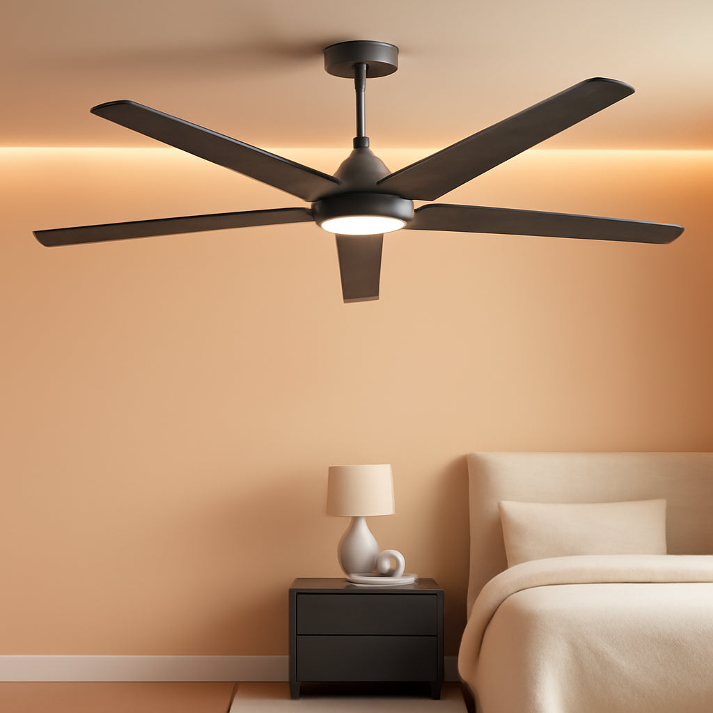 Ceiling fan in a bedroom with a bed and nightstand.