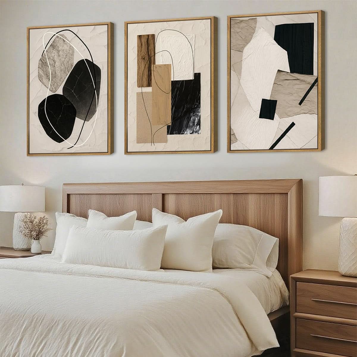 Three abstract art pieces above a bed in a bedroom setting.