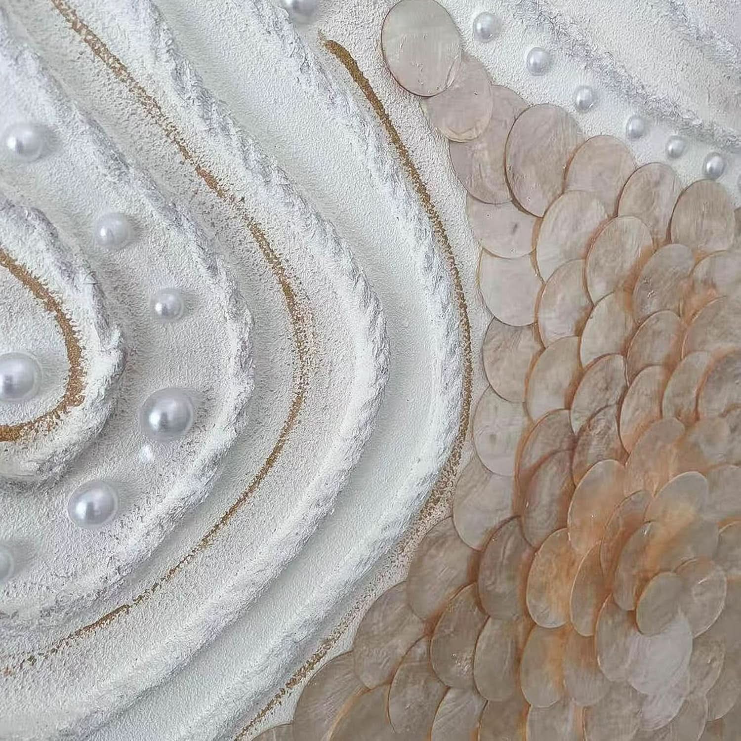 Close-up of decorative wall art with circular patterns and pearls.