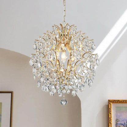 Gold chandelier with crystal accents hanging in a room.