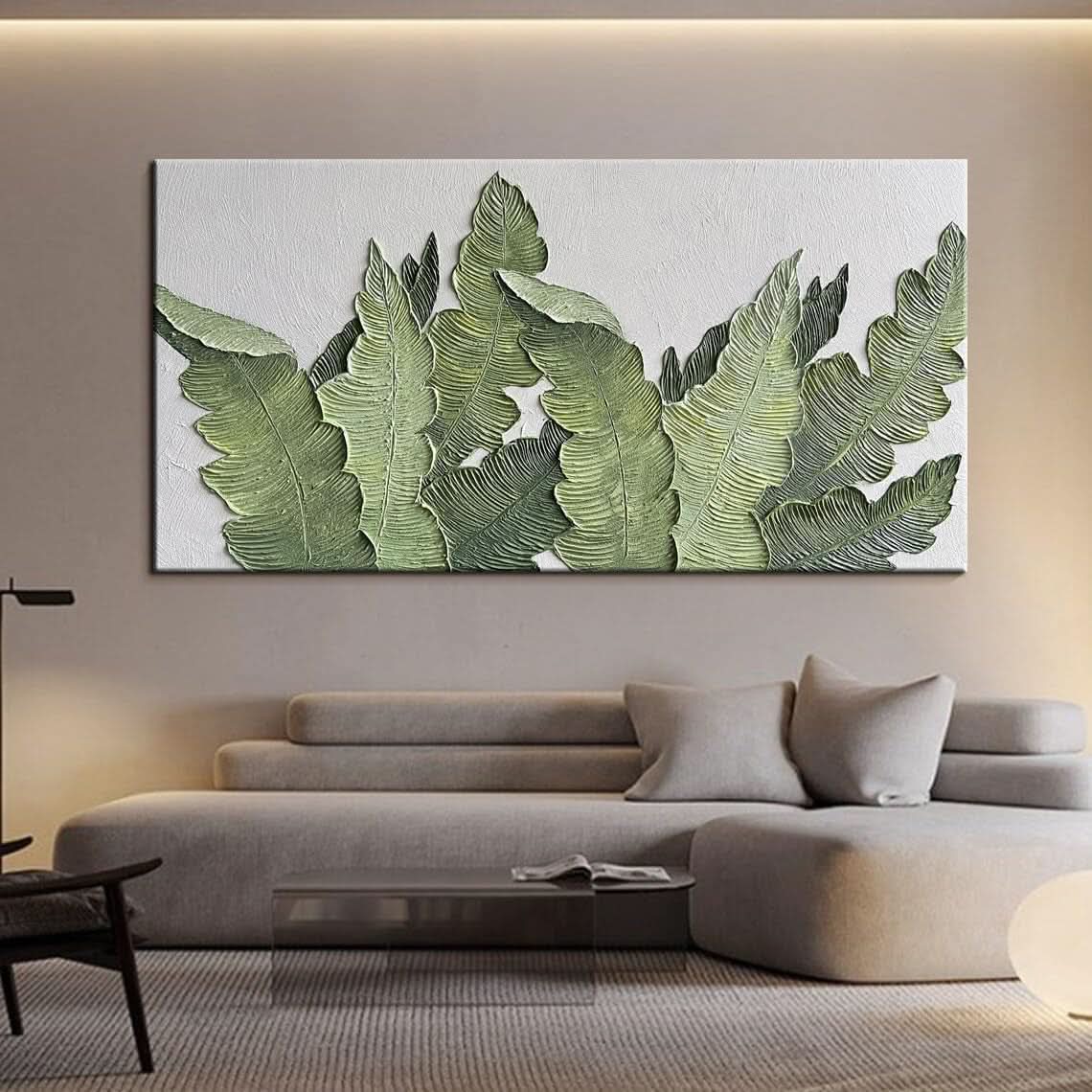 Living room with a large abstract painting of green leaves on the wall.