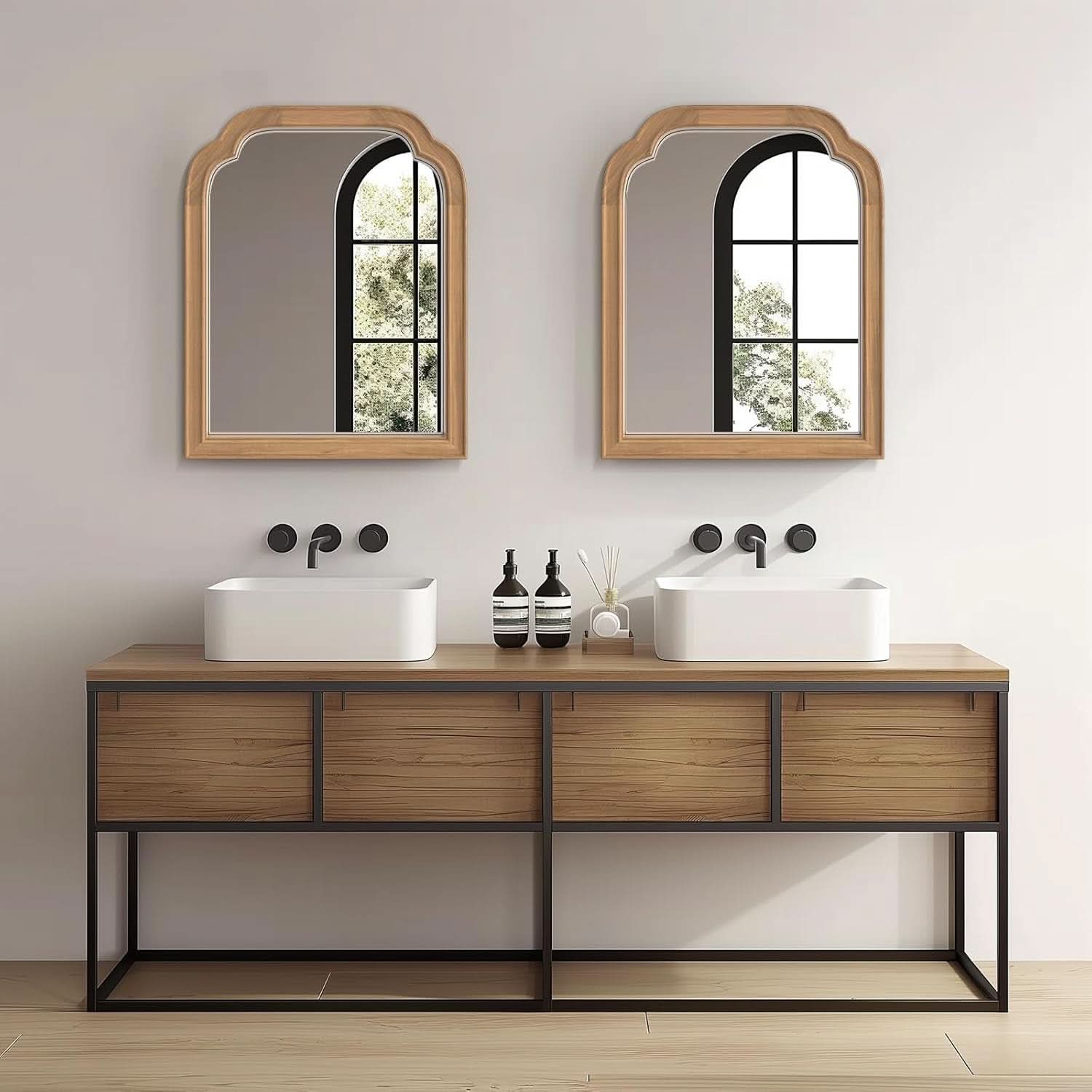 Bathroom vanity with double sink, mirrors, and decor on a neutral background