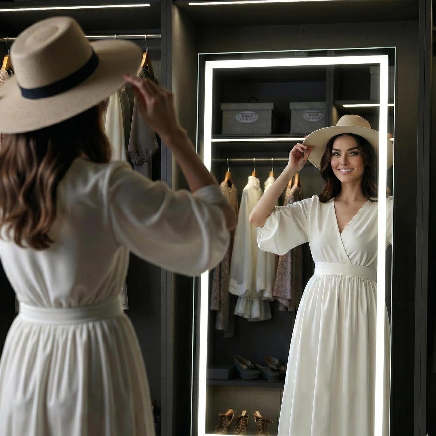 Woman in a white dress and hat adjusting her hat in front of a mirror.