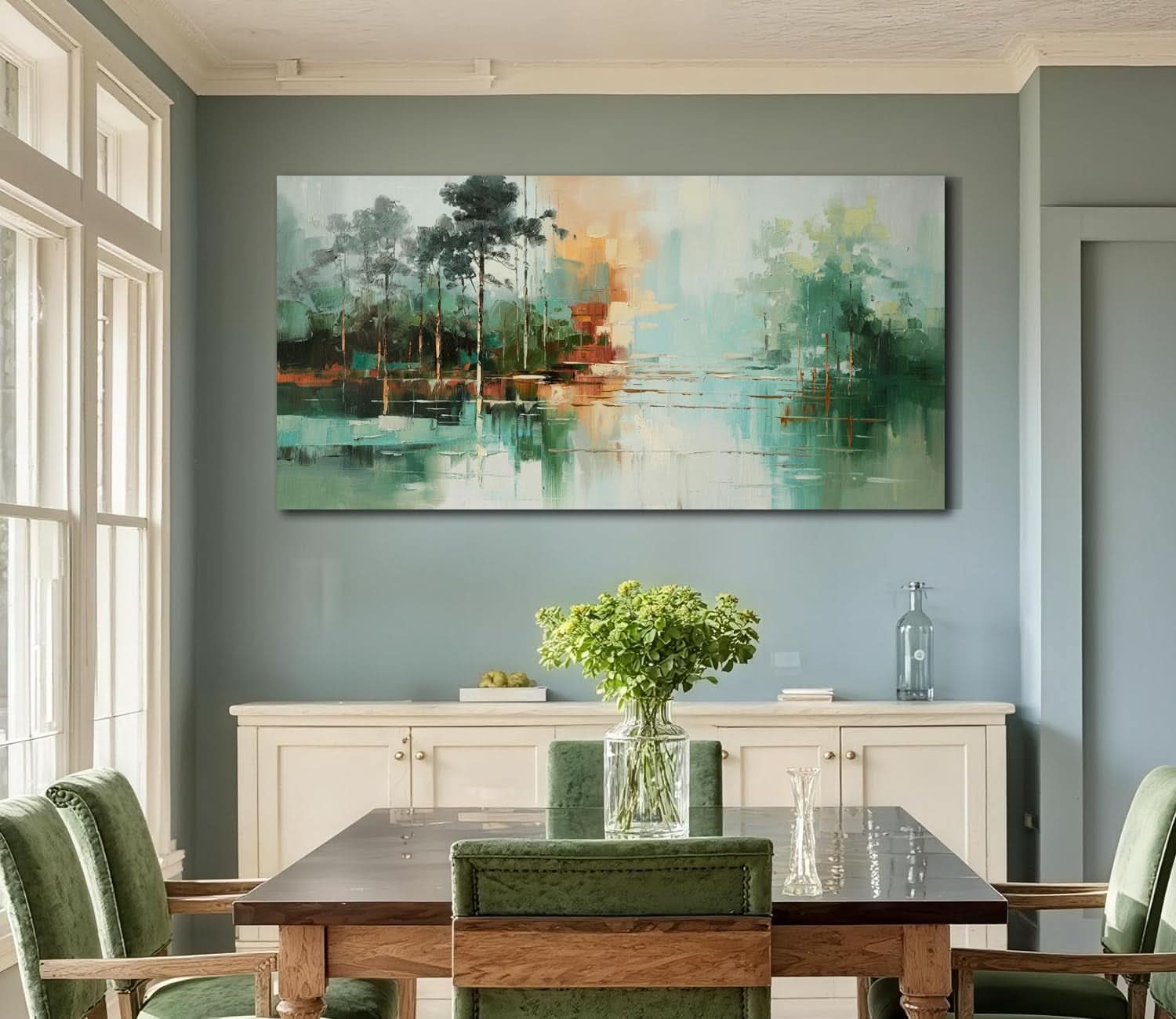 Dining room with a large abstract painting on the wall, wooden table, and green chairs.