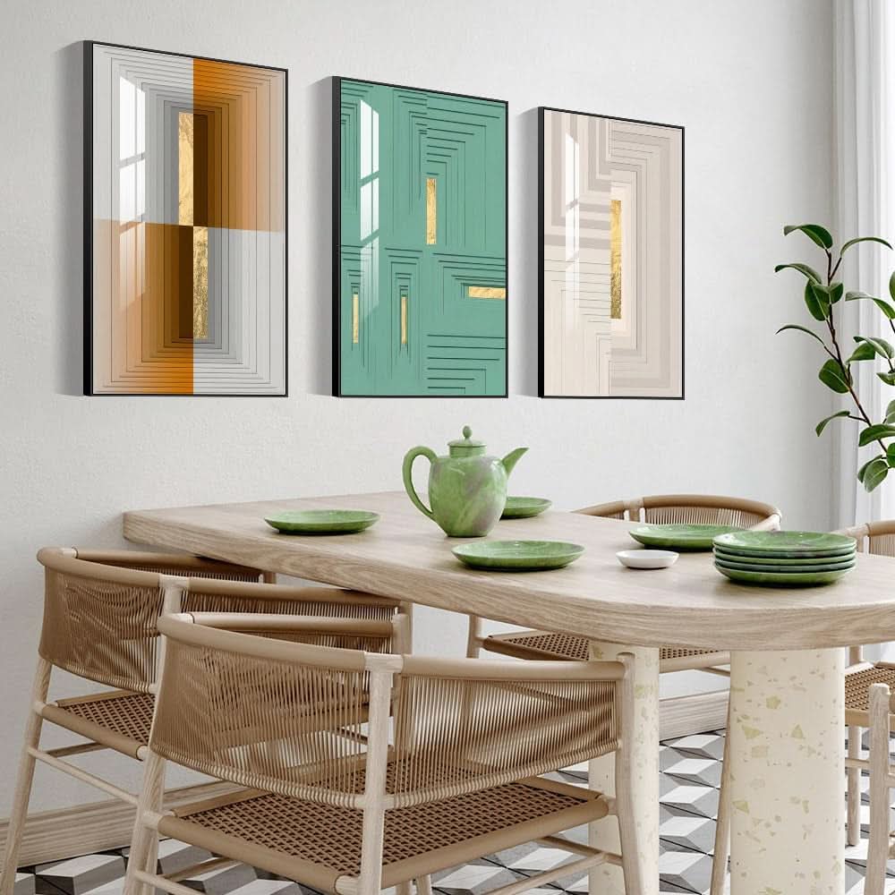 Dining room with wooden table, chairs, and decorative wall art.