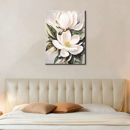Floral painting above a bed with beige headboard and pillows