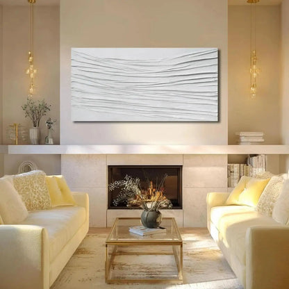 Modern living room with a fireplace, white walls, and decorative elements.